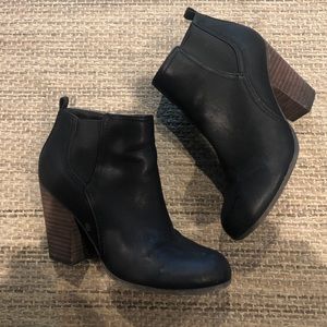 Brand new black booties with wood heel